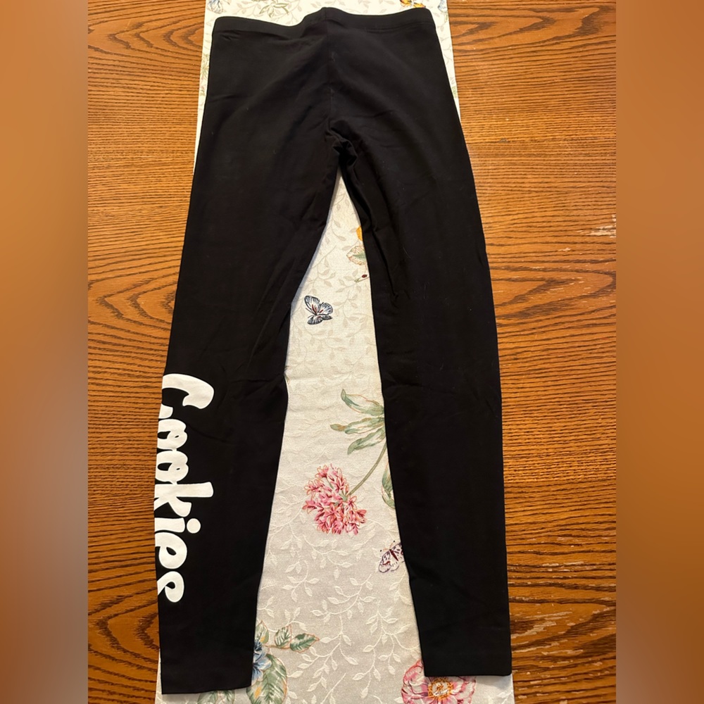 Cookies, black leggings